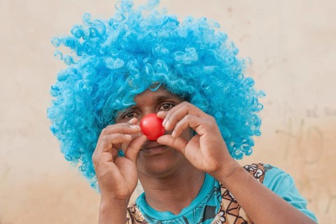 Member of a carnival club in the slums of Ribeira Bote