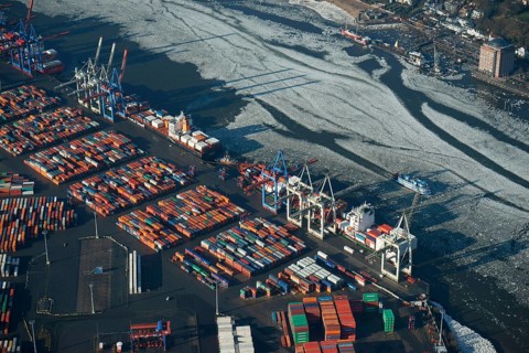 HHLA Container Terminal Burchardkai in winter with ice on the Elbe