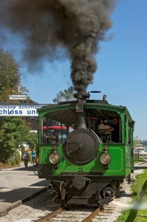 Steam locomotive with black smoke