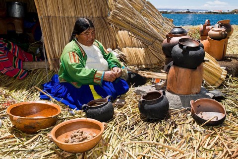 An elderly woman of the Uro Indians wearing typical attire