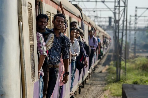 Crowded train arriving at Churchgate Railway Station