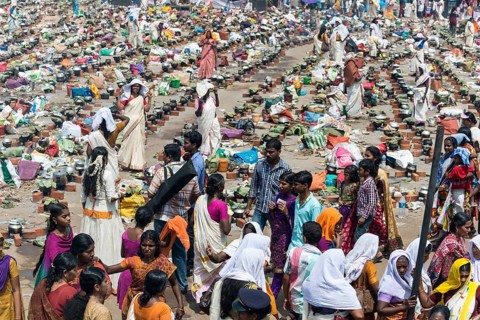 Women cooking Prasad during the Pongala festival