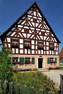 Half-timbered farmhouse on stone base