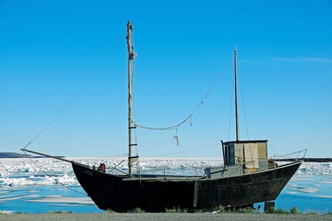 Old ship on the shore of the Beaufort Sea