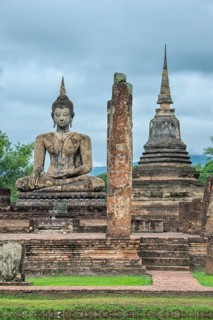 Buddha statue at the ruins of Wat Phra Si Rattana Mahathat temple complex