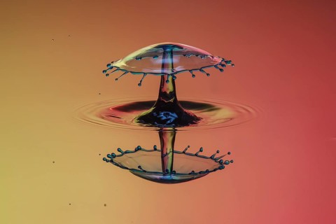 Three drops collide