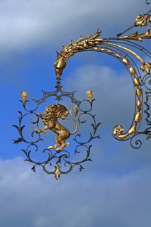 18th century hanging sign of the former 'Goldener Lowe' guesthouse