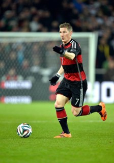 Bastian Schweinsteiger wearing the away strip
