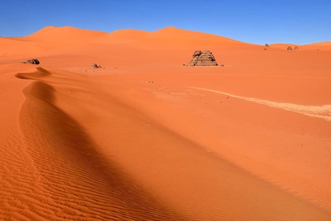 Sand dunes and rocks at Tin Merzouga