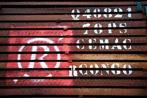 Labeled tropical timber on a truck