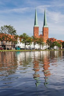 Cathedral reflected in Stadttrave river or Trave River