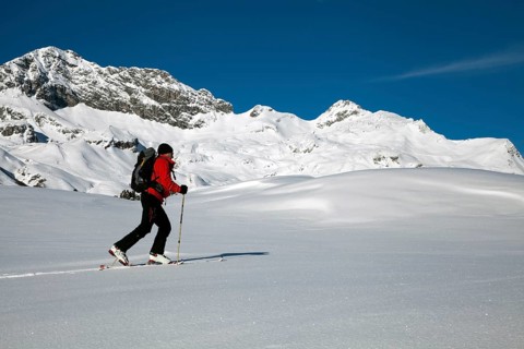 Ski tourer in the high valley above Lech am Arlberg