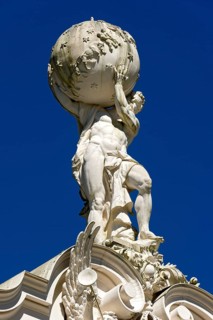 Statue of Atlas supporting the celestial sphere on the roof of Schloss Linderhof Palace