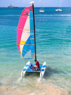 Catamaran leaving Rodney Bay