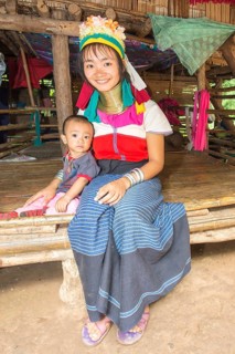 Long-necked woman with her baby