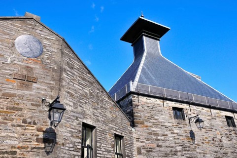 Building with the typical tower of a whiskey distillery