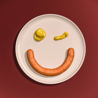 Sausage and drops of mustard