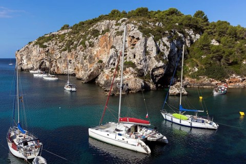 Sailing boats and yachts in Cales Coves Bay
