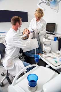 Woman receiving treatment at the dentist