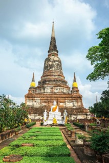 Buddha statues in front of the stupa at Wat Yai Chai Mongkhon