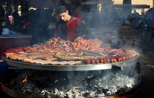 Cook handles giant barbecue at the annual All Saints Market in Cocentaina