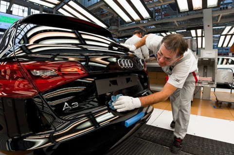 Man working on the production line of the Audi A3 at the Audi plant
