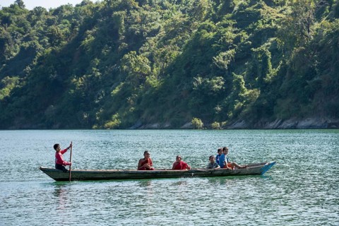 Children and novices in a boat on the Lemro River