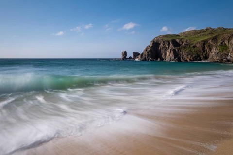 Waves break on the beach of Dalmore