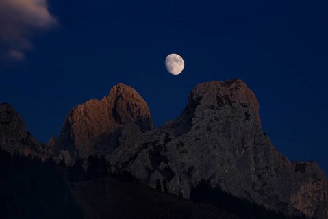 Waxing moon between Roten Fluh und Gimpel mountains in Tannheim Valley