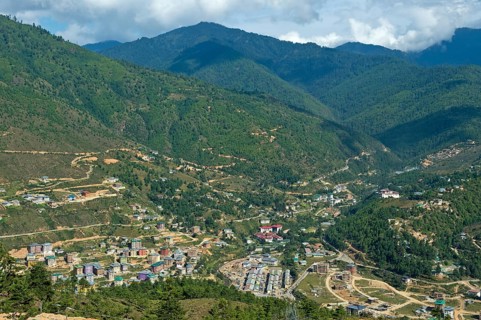 Construction of a new residential neighborhood on the outskirts of Thimphu as a result of rapid urbanization