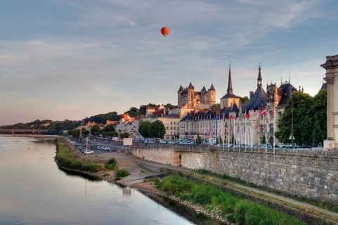 Loire river and the historic centre of Saumur with the castle and the Church of Saint-Pierre