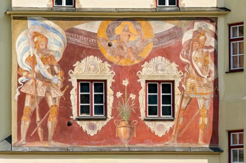 Medieval fresco with guardians in armour holding the Bavarian and Wasserburger standards below Jupiter on an eagle