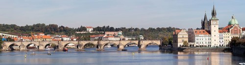 View over the Vltava River with the Bedrich Smetana Museum and Charles Bridge