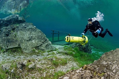 Scuba diver with a scooter