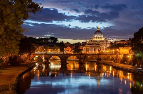 View from Ponte Umberto I across the Tiber River to Ponte Sant'Angelo and St. Peter's Basilica