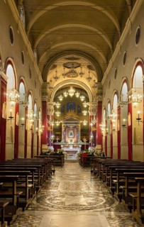 Interior view of the church of Santa Maria Maggiore with the grave of Cardinal Ippolito II d'Este underneath the high altar