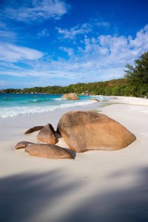 Sandy beach with the typical rock formations of the Seychelles