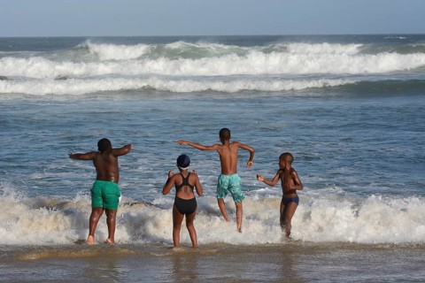 Children on the beach of East London