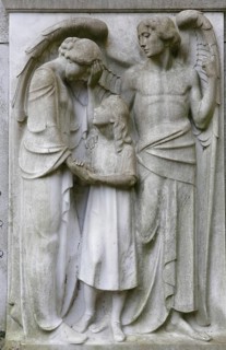 Angel with a mother and child on a gravestone