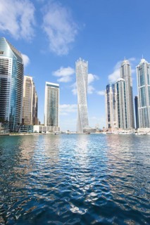 Cayan Tower and skyscrapers with marina