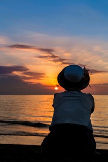 Woman watching the sunset