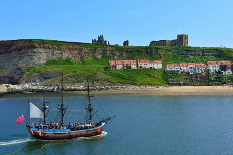 Historical excursion boat with three masts
