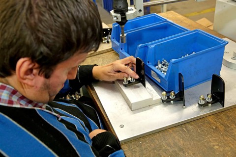 Mentally and physically disabled man at work