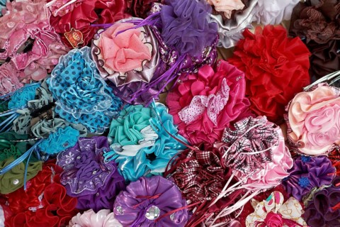 Colourful hair clips in a shop in the Muttrah Souq market