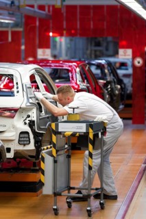 Man working on the production line of the Audi A3 at the Audi plant