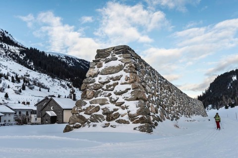 Stone wall as protection against avalanches