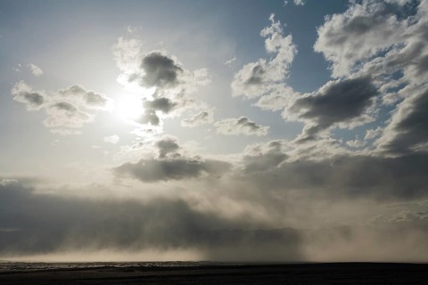 A sand storm over the Mesquite Flat Sand Dunes and the Panamint Range in the evening