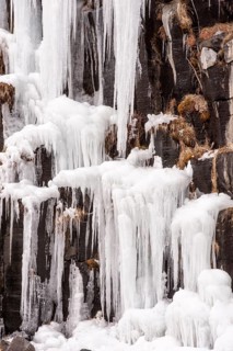 Svartifoss waterfall with icicles on the basaltic columns