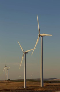 Windmills in the evening light on a wind farm near Sanlucar de Barrameda