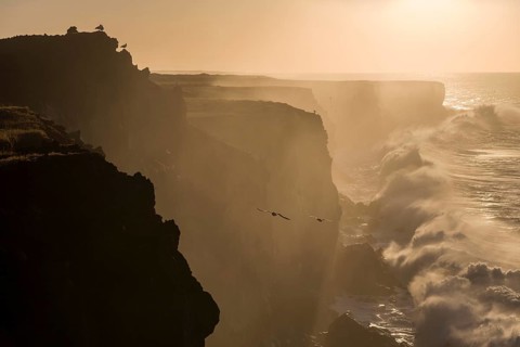 Surf below the coastal cliffs